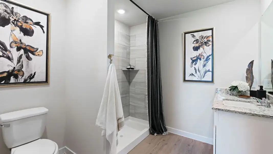 Furnished interior in a model home at Flagstop Crossing in Odem (Image 16).