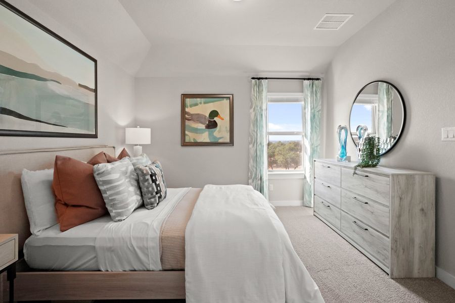 Bedroom in the Lakeside at Tessera Willow model home in Lago Vista TX by Trophy Signature Homes