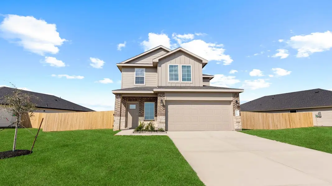 Front exterior of a home in the Caldwell Ranch community, located in Iowa Colony, TX (Image 4). Front exterior of a home in the Caldwell Ranch community, located in Iowa Colony, TX (Image 4).
