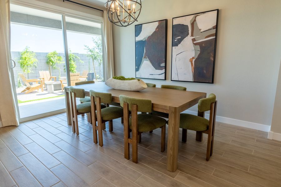 Furnished interior in a model home at Blossom Rock Reserve Series in Apache Junction (Image 10).