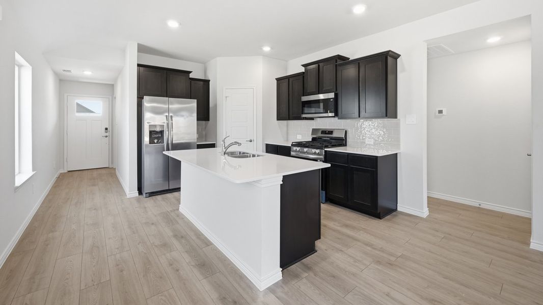 Furnished interior in a model home at Windchime in Celina (Image 4).