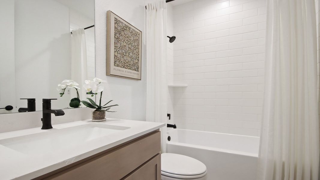 Furnished interior in a model home at Mill Creek Estates in Magnolia (Image 25). Furnished interior in a model home at Mill Creek Estates in Magnolia (Image 25).