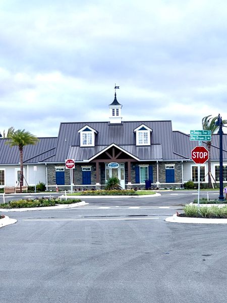 Charming clubhouse with a modern roof in Reverie at Silverleaf by Dream Finders Homes, St. Augustine, FL. Charming clubhouse with a modern roof in Reverie at Silverleaf by Dream Finders Homes, St. Augustine, FL.