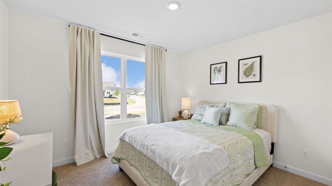Furnished interior in a model home at Prairie Pass Express in Apison (Image 5).