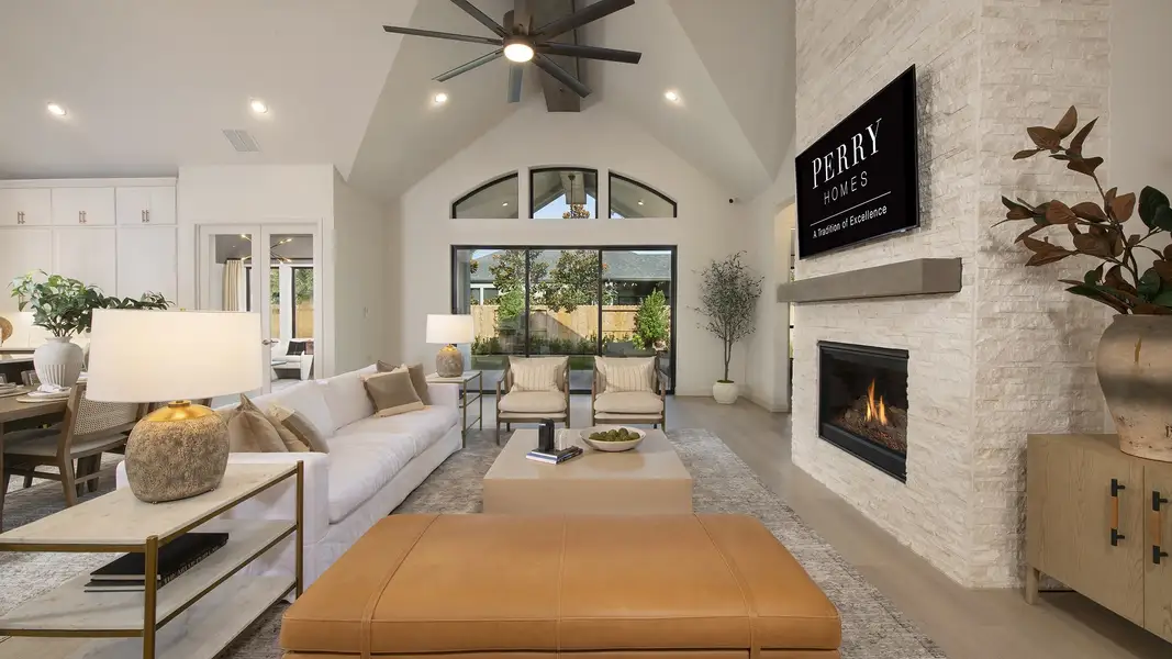 Furnished interior in a model home at The Highlands 65' in Porter (Image 8).