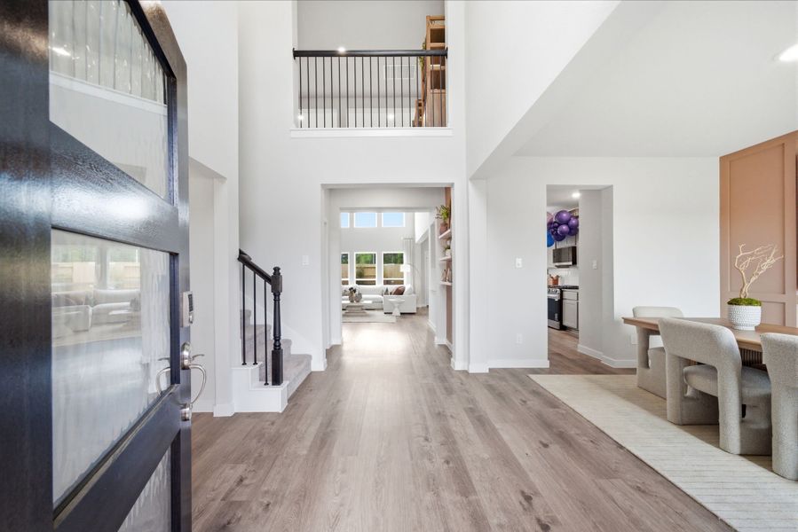A room with a wood floor and a wood floor.