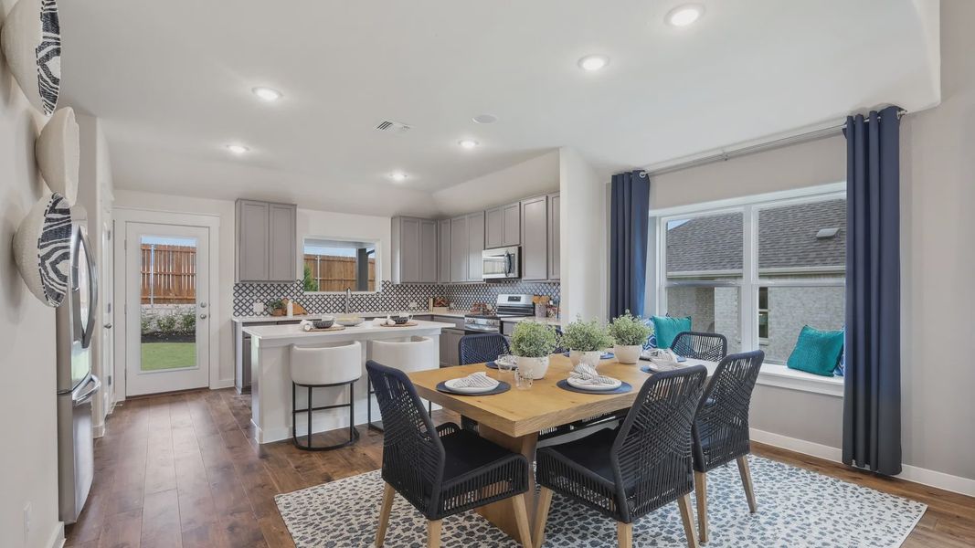 Elegant hardwood floors and sleek cabinetry enhance this sophisticated Churchill home. Elegant hardwood floors and sleek cabinetry enhance this sophisticated Churchill home.