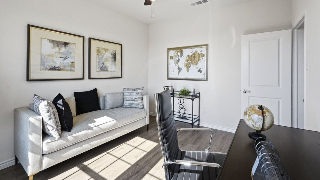 Furnished interior in a model home at The Woods at Lindsey Place in Anna (Image 48).