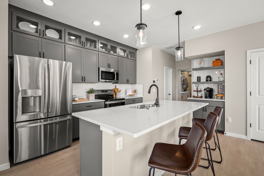 Furnished interior in a model home at Revel Crossing at Wolf Ranch – The Ascent Collection in Colorado Springs (Image 5).