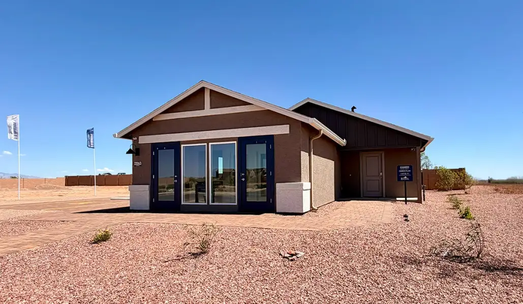 Front exterior of a home in the Red Rock Village community, located in Red Rock, AZ (Image 4).
