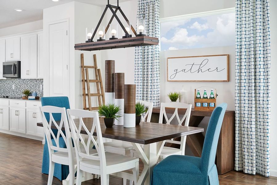 Furnished interior in a model home at Highfield at Twisted Oaks in Wildwood (Image 53).