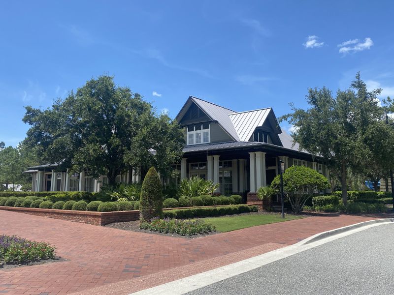 A charming home with lush landscaping and a brick path in RiverTown - Forest by Mattamy Homes (St. Johns, FL).