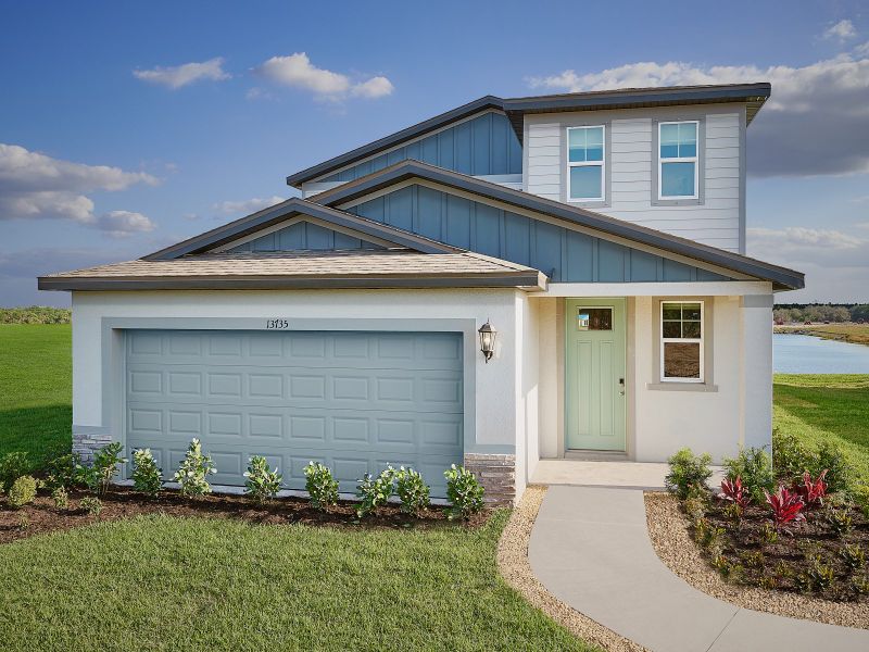Front exterior of a home in the Salt Meadows - Premier Series community, located in Parrish, FL (Image 3). Front exterior of a home in the Salt Meadows - Premier Series community, located in Parrish, FL (Image 3).
