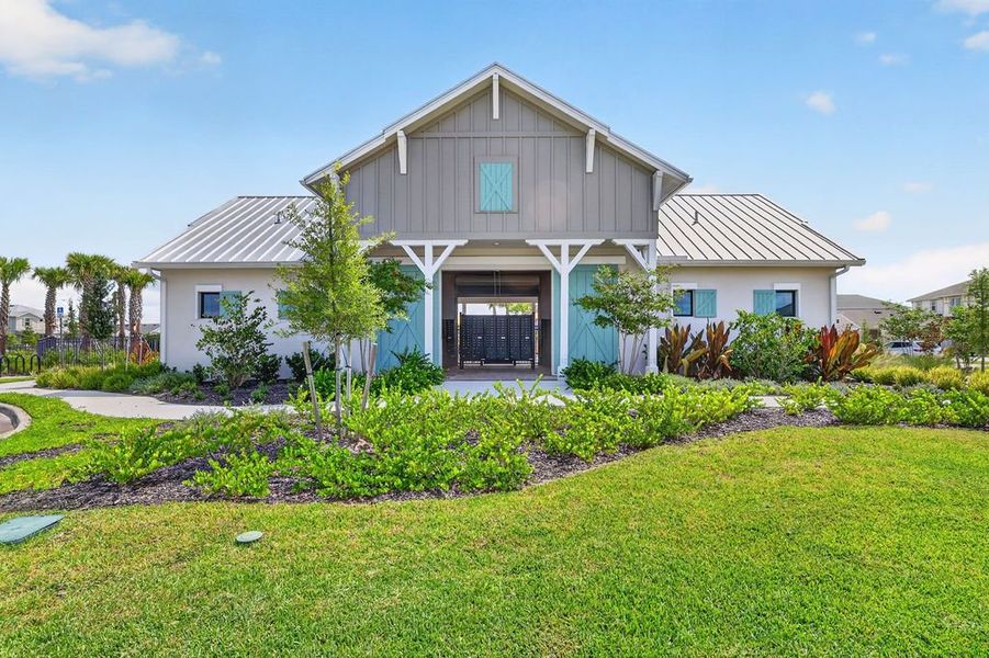 Front exterior of a home in the The Sanctuary – Coastal Collection community, located in Punta Gorda, FL (Image 4).