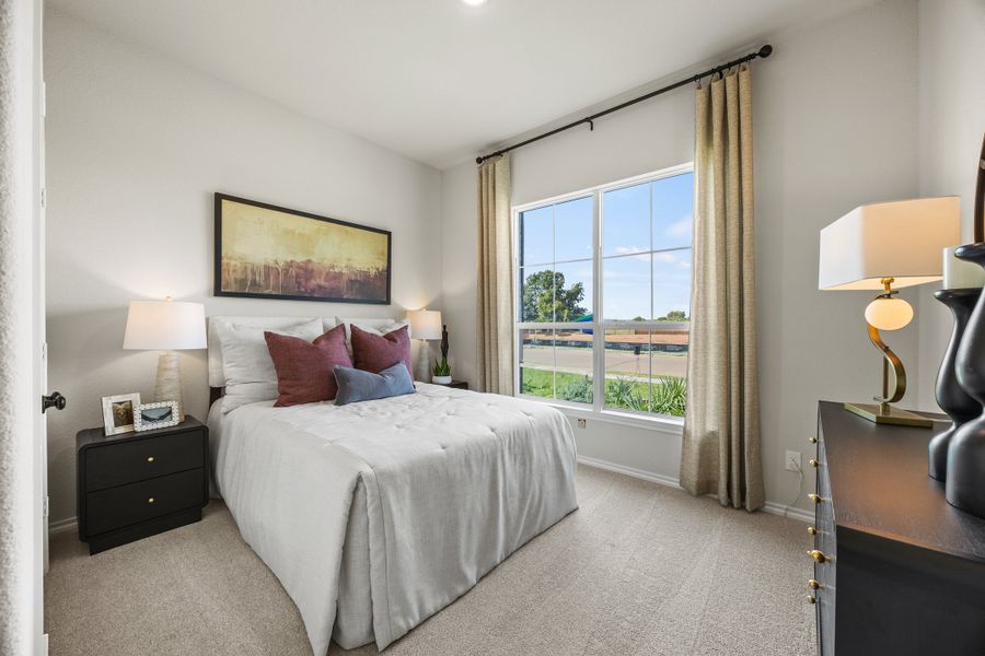 Furnished interior in a model home at El Dorado in Granbury (Image 20).