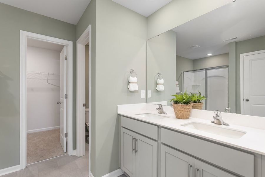 Furnished interior in a model home at Cedar Oaks in Greensboro (Image 16).