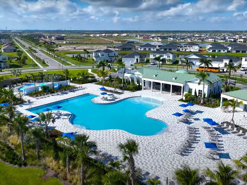 Aerial view of the Meritage Homes at Central Park community in Port St. Lucie, FL, showing layout and nearby surroundings (Image 10).