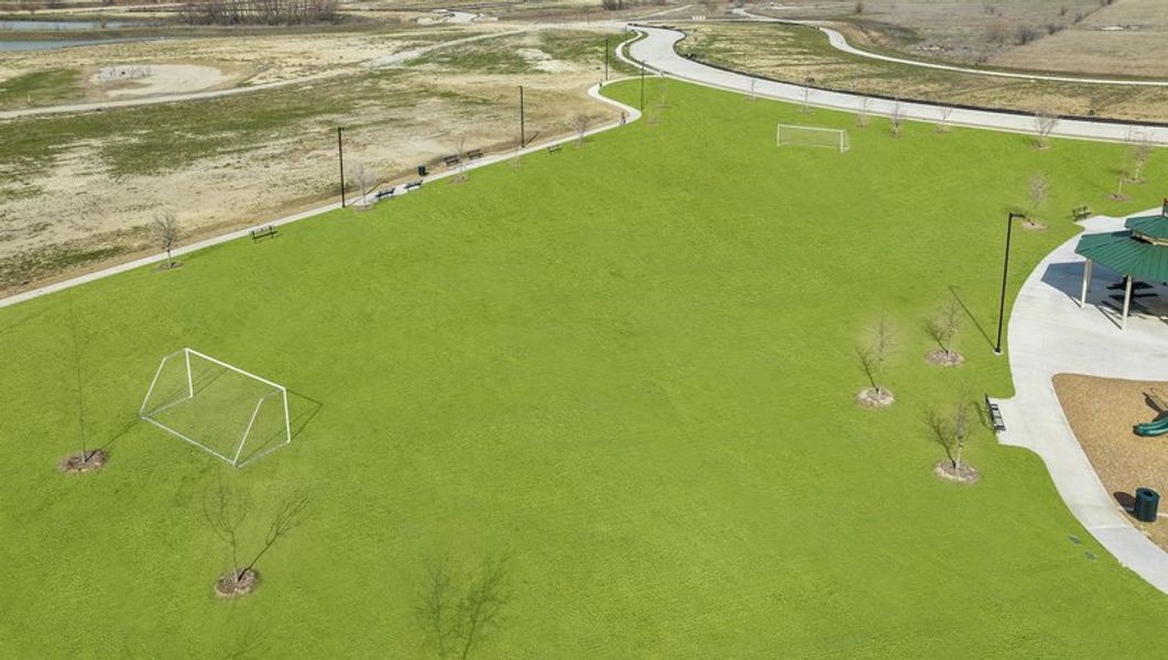 The soccer field provides open grass space to run and play.