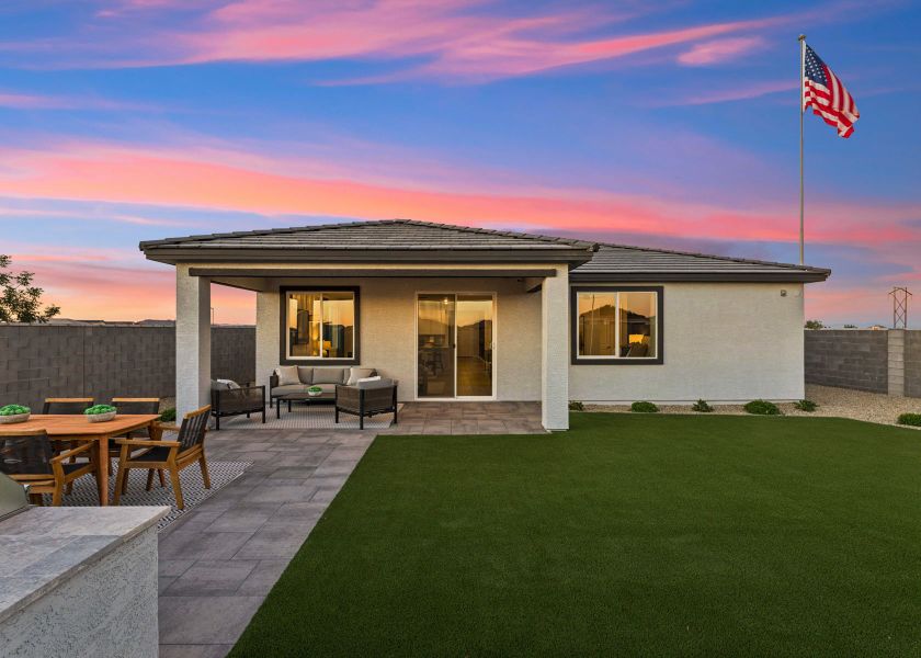 A house with a flag on the roof.