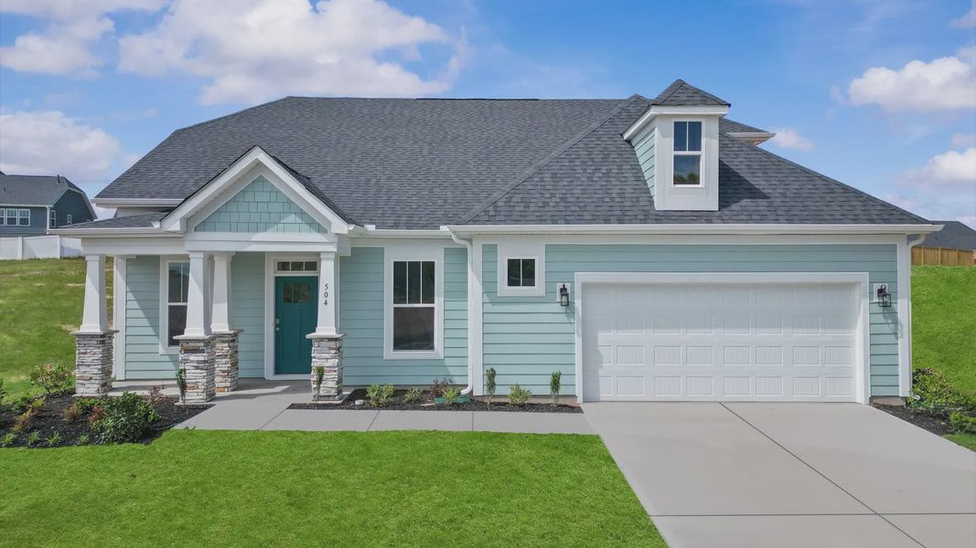 Ranch style home in Wells Crossing by DRB Homes in Seneca, SC with Pickleball courts and large yard