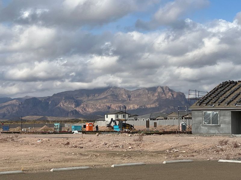 New homes under construction with scenic mountain views in Seasons at Entrada Del Oro by Richmond American Homes (Gold Canyon, AZ).