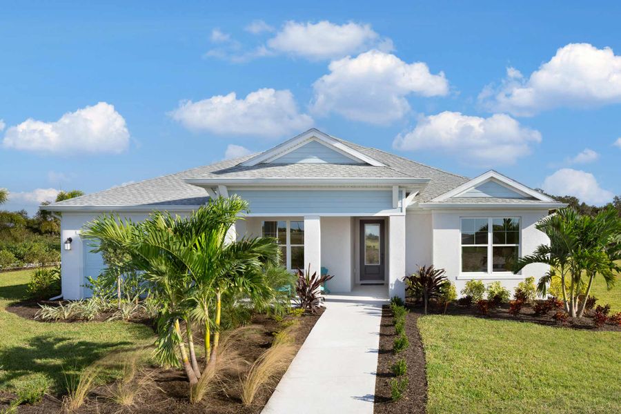 Front exterior of a home in the Coasterra community, located in Palmetto, FL (Image 2).