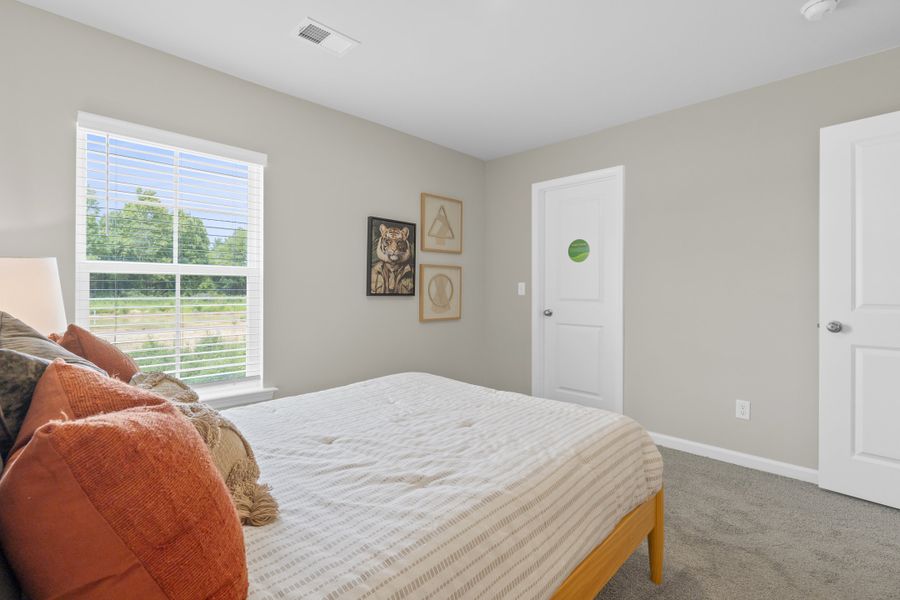Furnished interior in a model home at Crystal Downs in Sumter (Image 26).
