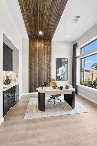 Furnished interior in a model home at Caliterra in Dripping Springs (Image 53).