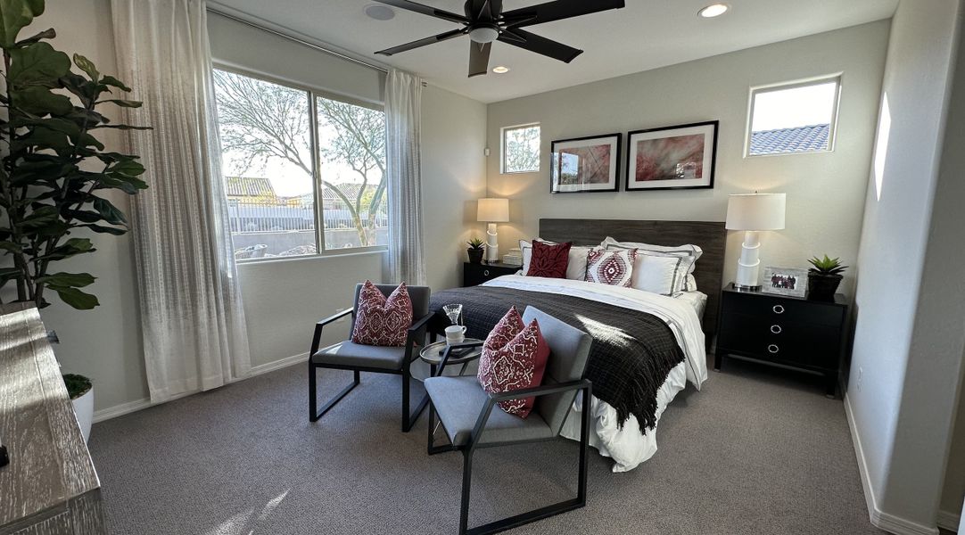 Furnished interior in a model home at CantaMia at Estrella 55+ in Goodyear (Image 23).