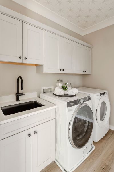 Furnished interior in a model home at Mayes Hall in Davidson (Image 58).