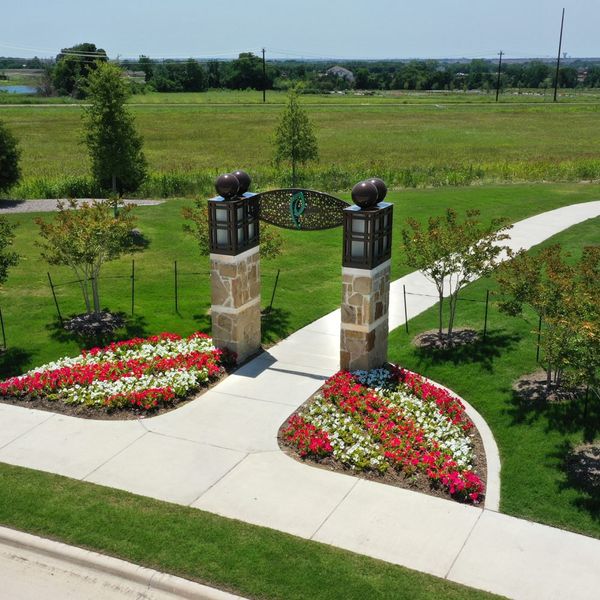Entrance to the The Parks at Wilson Creek community in Celina, TX, featuring signage and landscaping (Image 10).