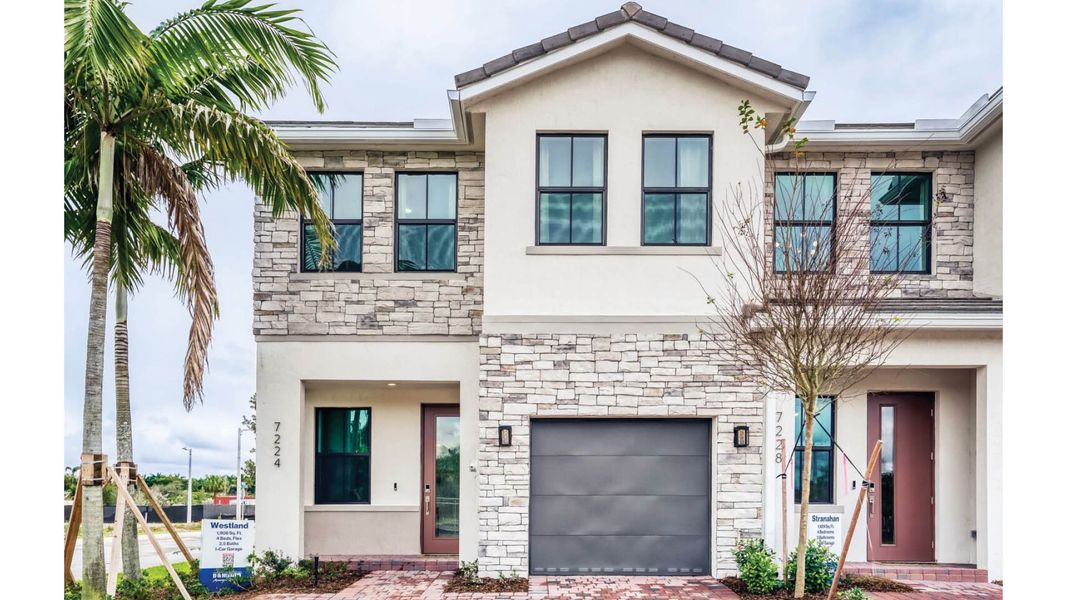 Front exterior of a home in the Vineyards community, located in Davie, FL (Image 10).