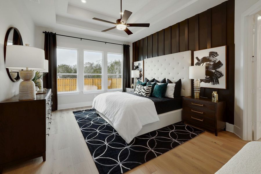 Furnished interior in a model home at New Haven - 60' in Manor (Image 15).