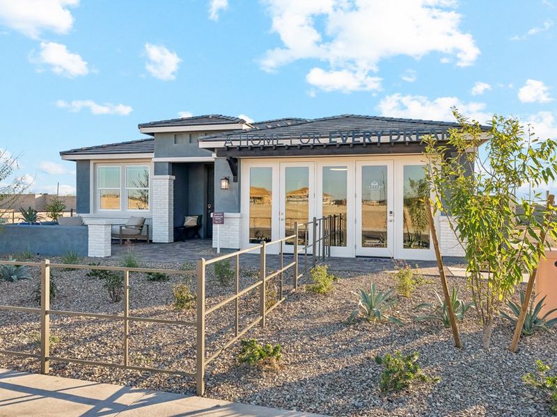 A house with a fence around it. A house with a fence around it.