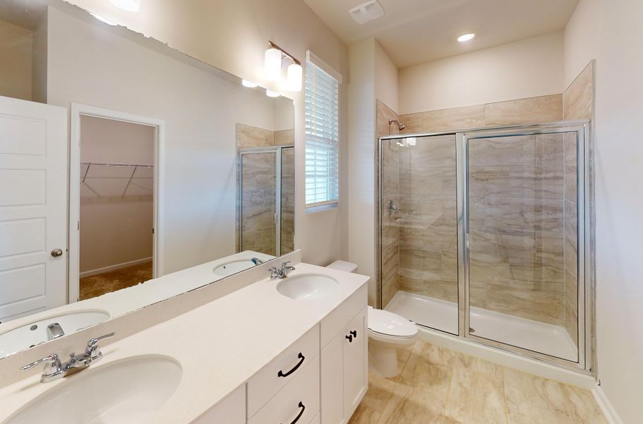 The large Owner's Suite with en suite bathroom is perfectly situated in the end unit Imperial Plan.