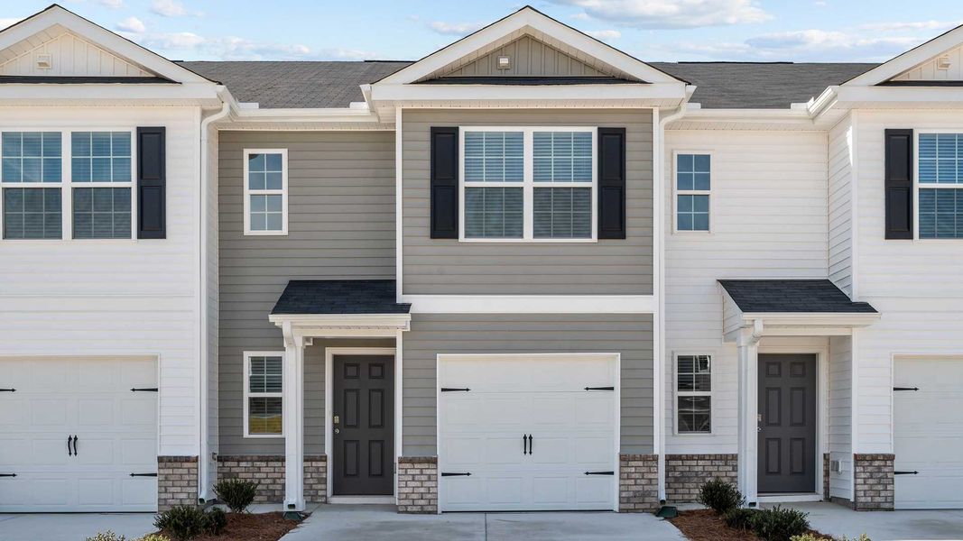 Front exterior of a home in the The Townes at Carter Ridge community, located in Greenville, NC (Image 2).