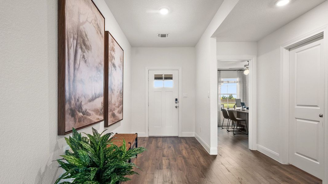 Furnished interior in a model home at Railhead in Cedar Creek (Image 5).