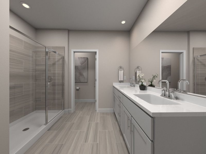 The primary bathroom offers dual vanity sinks and a walk-in shower.
