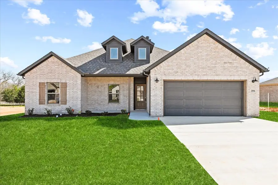 Front exterior of a home in the Fair Oaks community, located in Runaway Bay, TX (Image 1). Front exterior of a home in the Fair Oaks community, located in Runaway Bay, TX (Image 1).