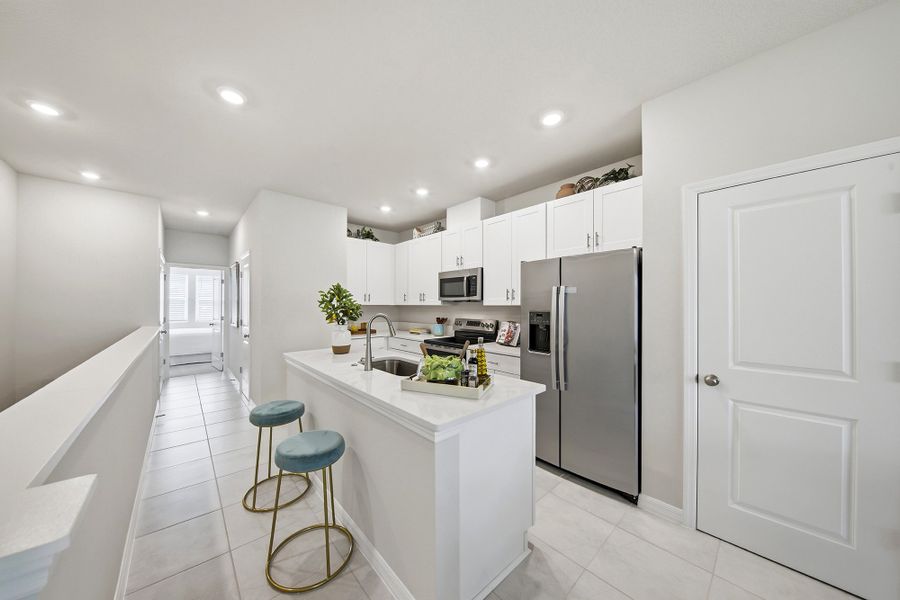 Furnished interior in a model home at Preserve at The Cays – The Driftwood Series in Daytona Beach (Image 5).