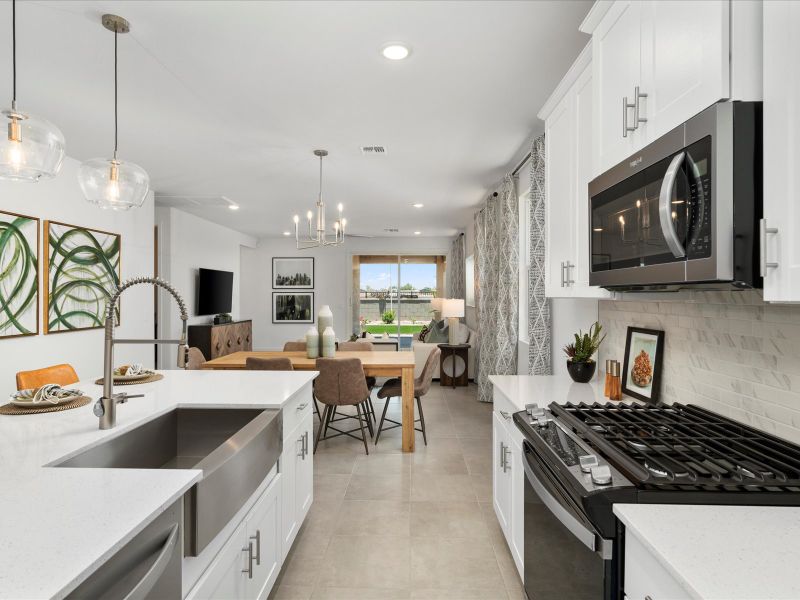 Furnished interior in a model home at San Tan Groves - Classic Series in San Tan Valley (Image 7).