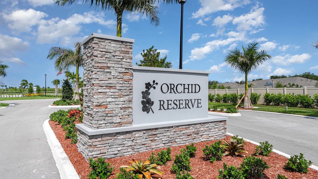 Entrance to the Orchid Reserve community in Sebastian, FL, featuring signage and landscaping (Image 1).