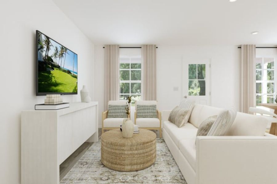 A living room with a tv and couches. A living room with a tv and couches.