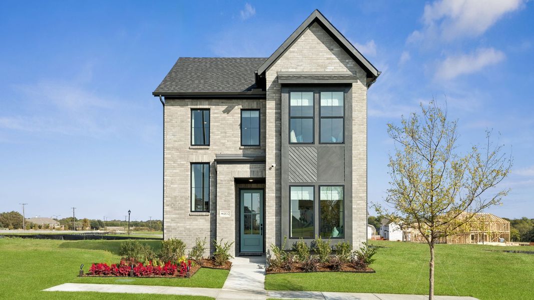 Front exterior of a home in the Painted Tree - Woodland North community, located in McKinney, TX (Image 4).