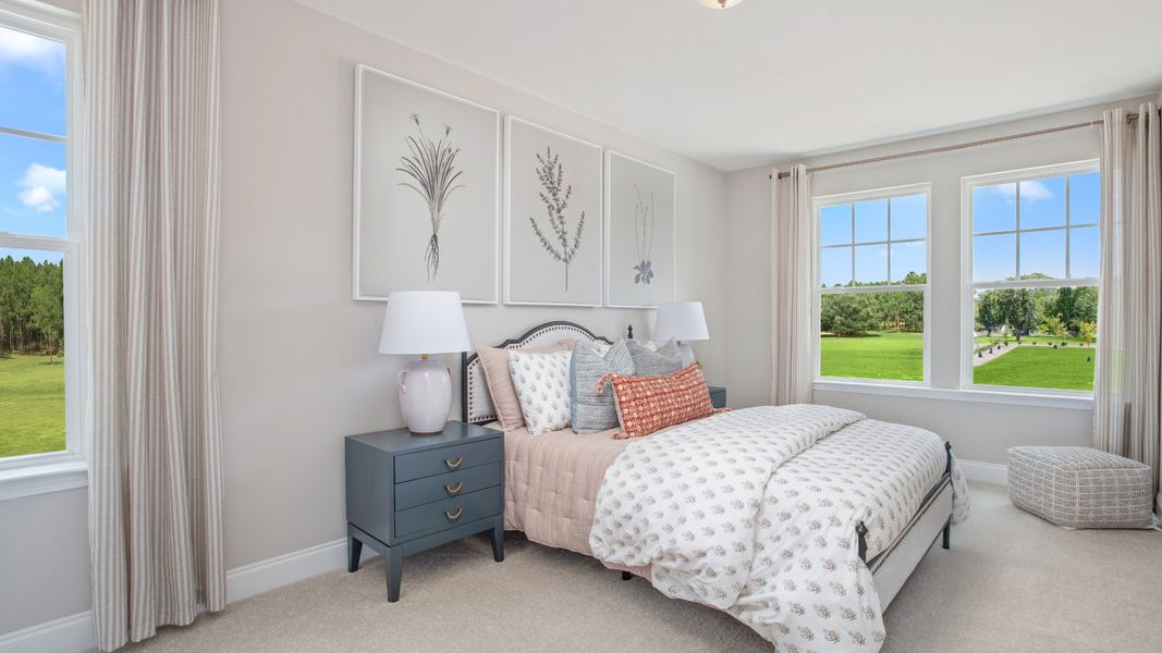 Furnished interior in a model home at Sidney Creek Townhomes in Zebulon (Image 38).