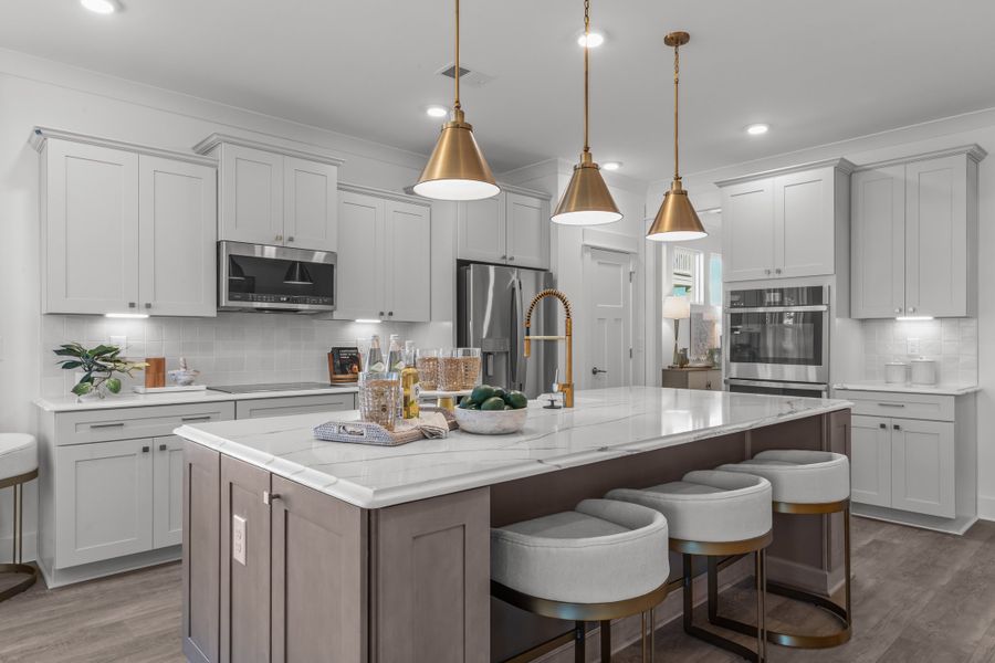 Furnished interior in a model home at Belmont at Albemarle in Hertford (Image 7).