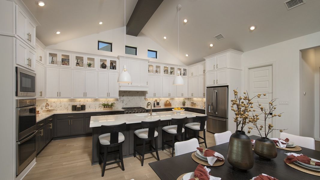 Furnished interior in a model home at Cane Island 80' in Katy (Image 14).