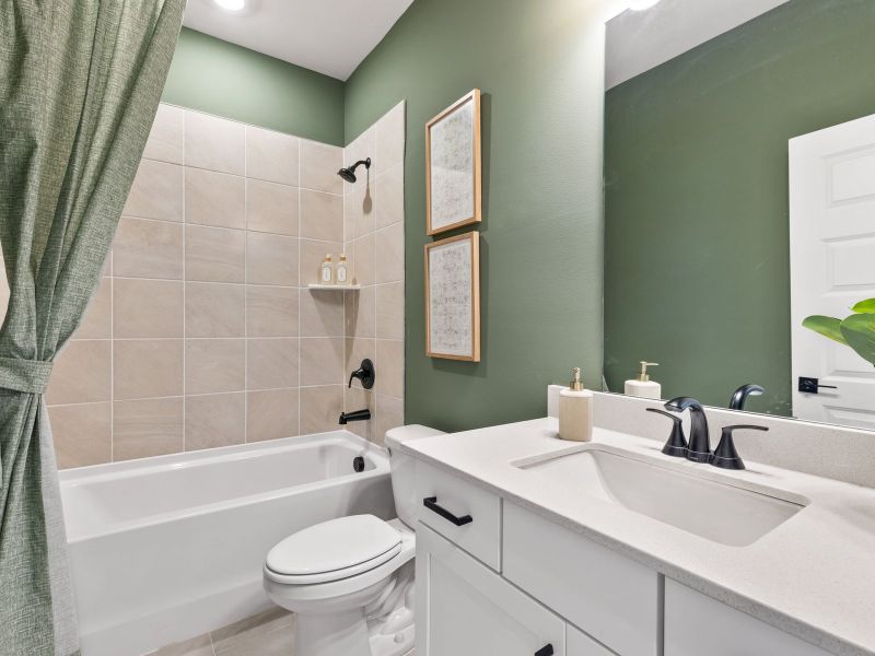 Enjoy the modern finishes in the secondary bathroom.