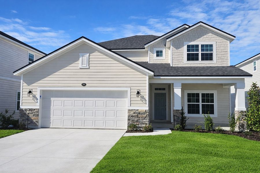 Front exterior of a home in the Amberly community, located in Green Cove Springs, FL (Image 4).