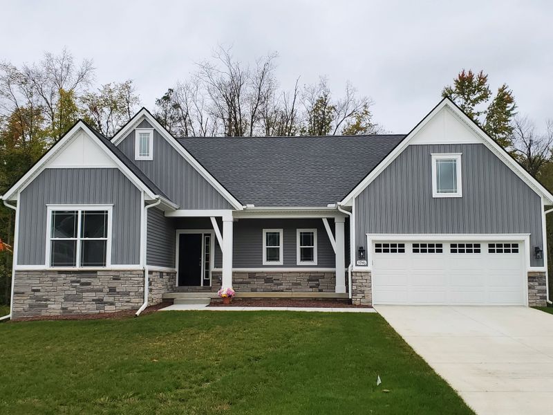Front exterior of a home in the Preserve at Magnolia Park community, located in Jackson, MI (Image 10). Front exterior of a home in the Preserve at Magnolia Park community, located in Jackson, MI (Image 10).
